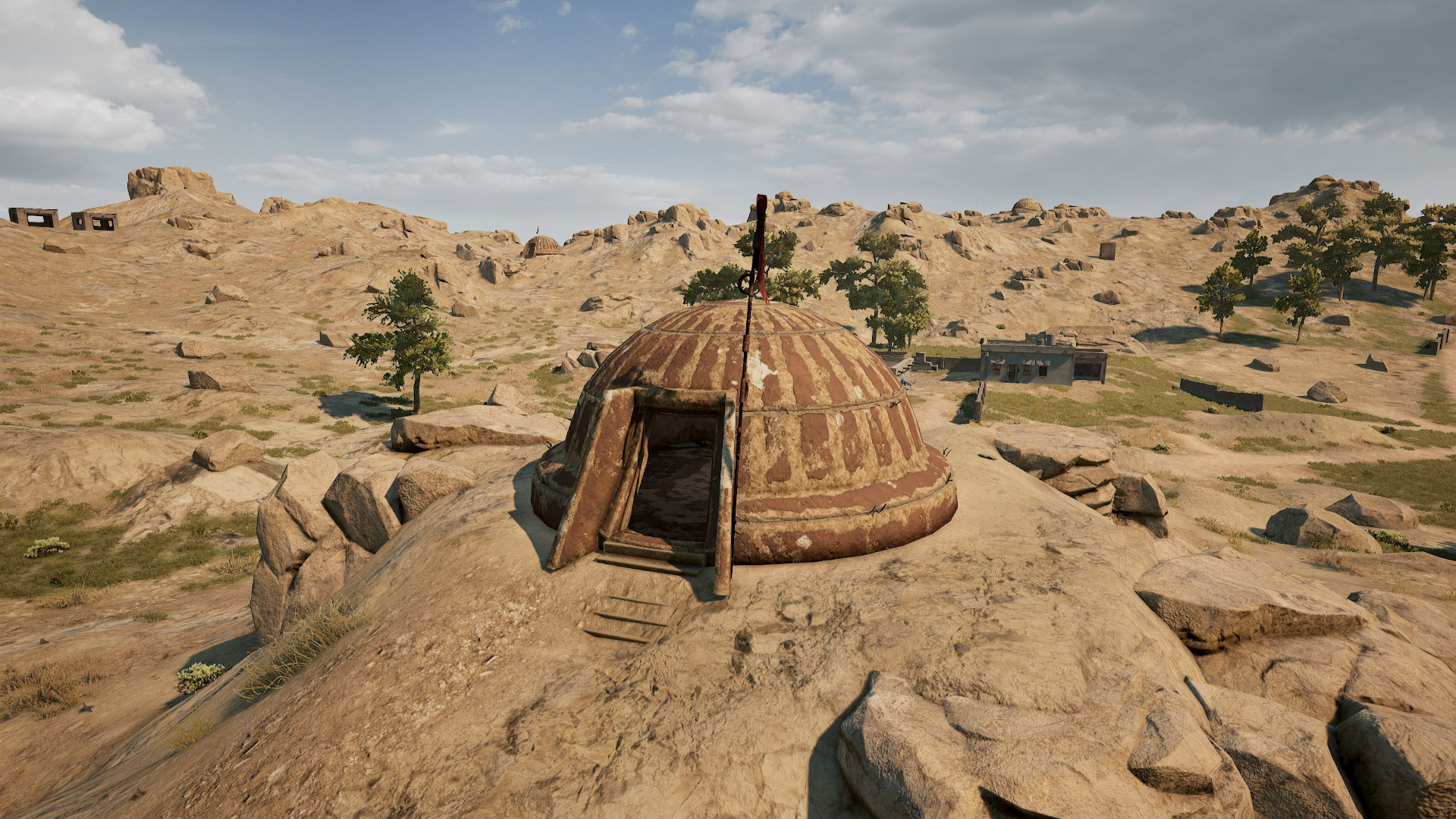 Best PUBG Karakin drops: A small hut on top of a rocky hill.