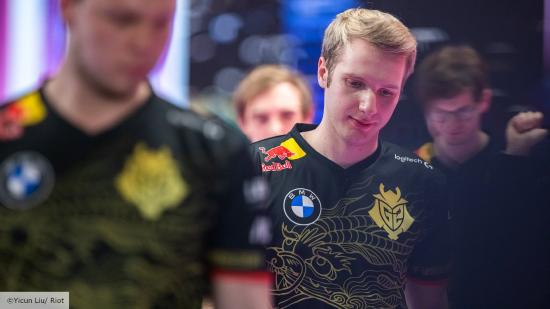 League of Legends player Jankos walking off stage wearing a black and gold G2 jersey
