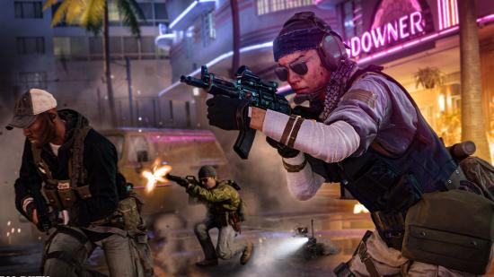 Call of Duty Black Ops Cold War multiplayer modes: Three soldiers aiming and firing to the left in a neon-lit urban area.