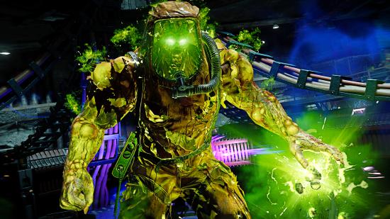 Best Black Ops Cold War Zombies weapons: A large, glowing green Zombie in a hazmat suit looking towards the camera with glowing eyes.