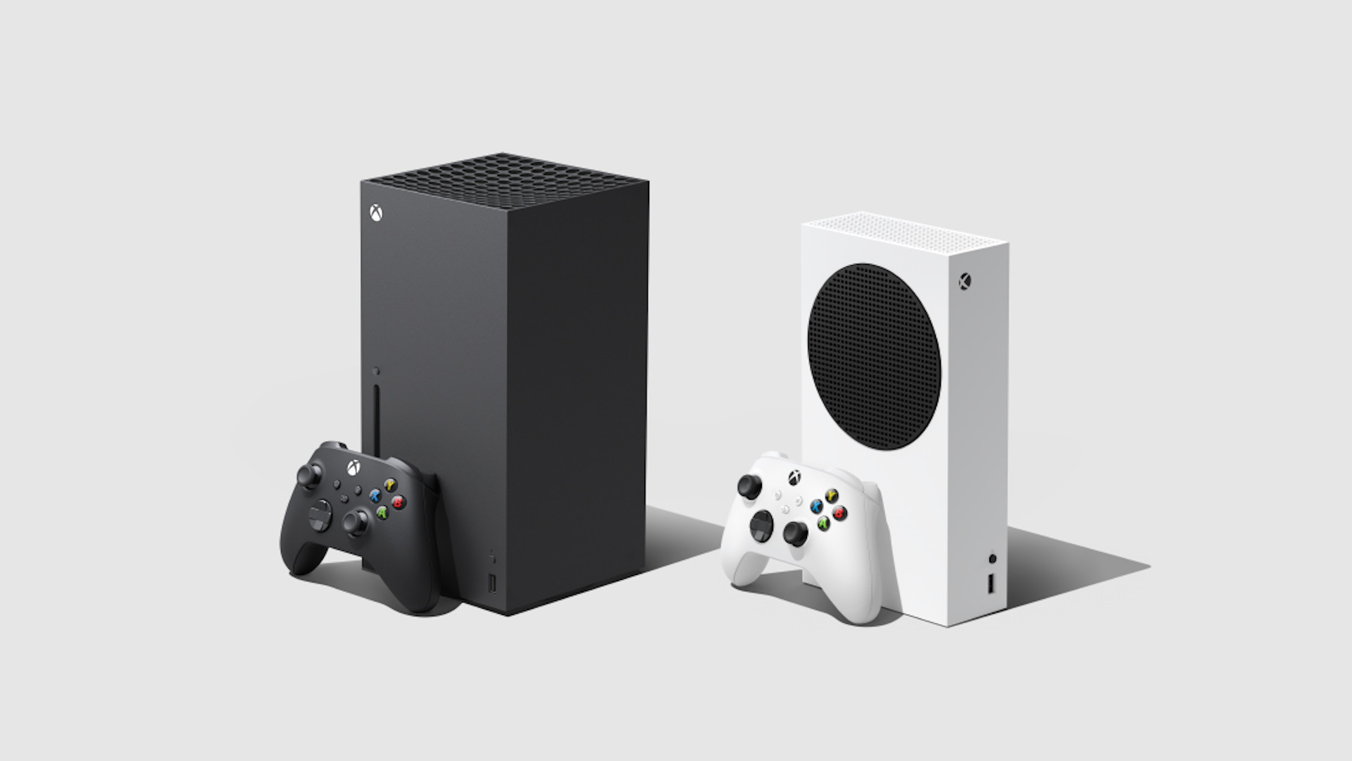 Xbox Series X|S setup: Xbox Series X and S consoles and their respective controllers placed on a white background.