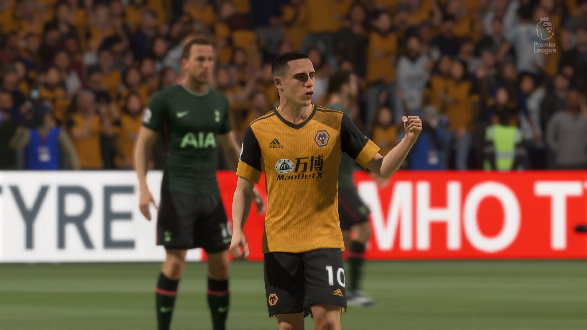 Best FIFA 21 Nickname cards: Wolves players, with one at the center of the image celebrating with one hand clenched in a fist.