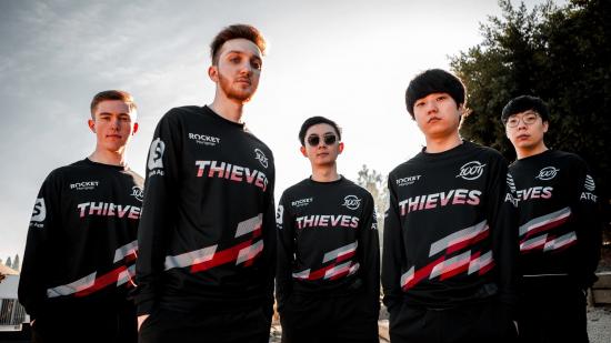 The 100 Thieves League of Legends team for 2021, wearing a black jersey with red and white details