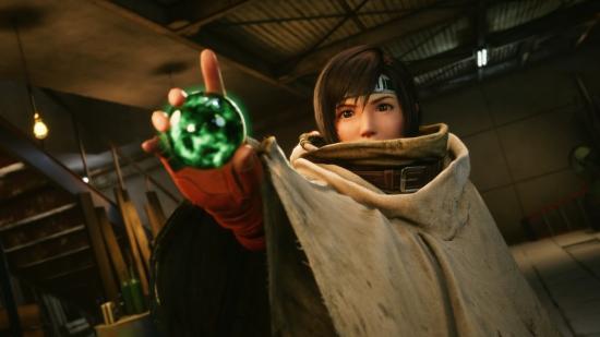Yuffie, wearing an oversized beige poncho, points towards the camera, holding a green materia orb in her pointing hand