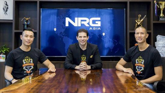Three executives of NRG Asia sit at a desk