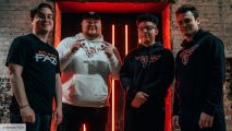 The four players of Atlanta FaZe, stood in a line, wearing white or black FaZe-branded merch