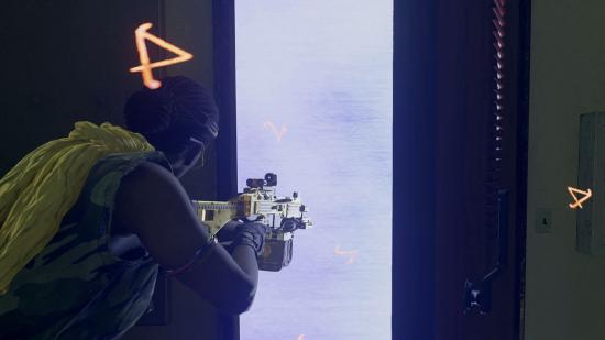 An operator holding a golden machine gun approaches a Red Door fast travel portal in Warzone