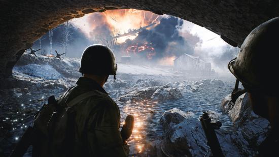 Two US soldiers under a bridge look out to the Battle of the Bulge