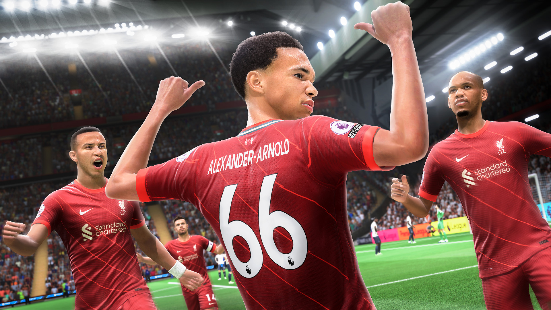 FIFA 22 release date: Trent Alexander-Arnold celebrates a goal by pointing to the back of his Liverpool shirt.