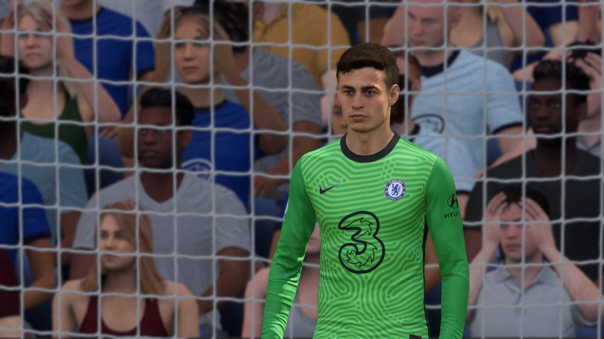FIFA 22 best keepers: Courtois stands in the goal in a green Chelsea keepers strip.