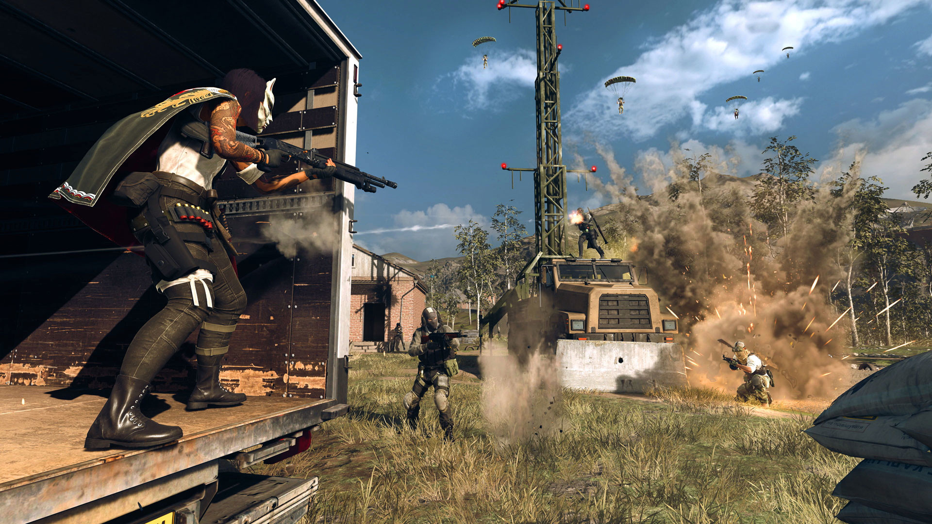 Warzone broadcast stations: A soldier wearing a mask and cloak firing at enemies in the distance from the back of a truck.