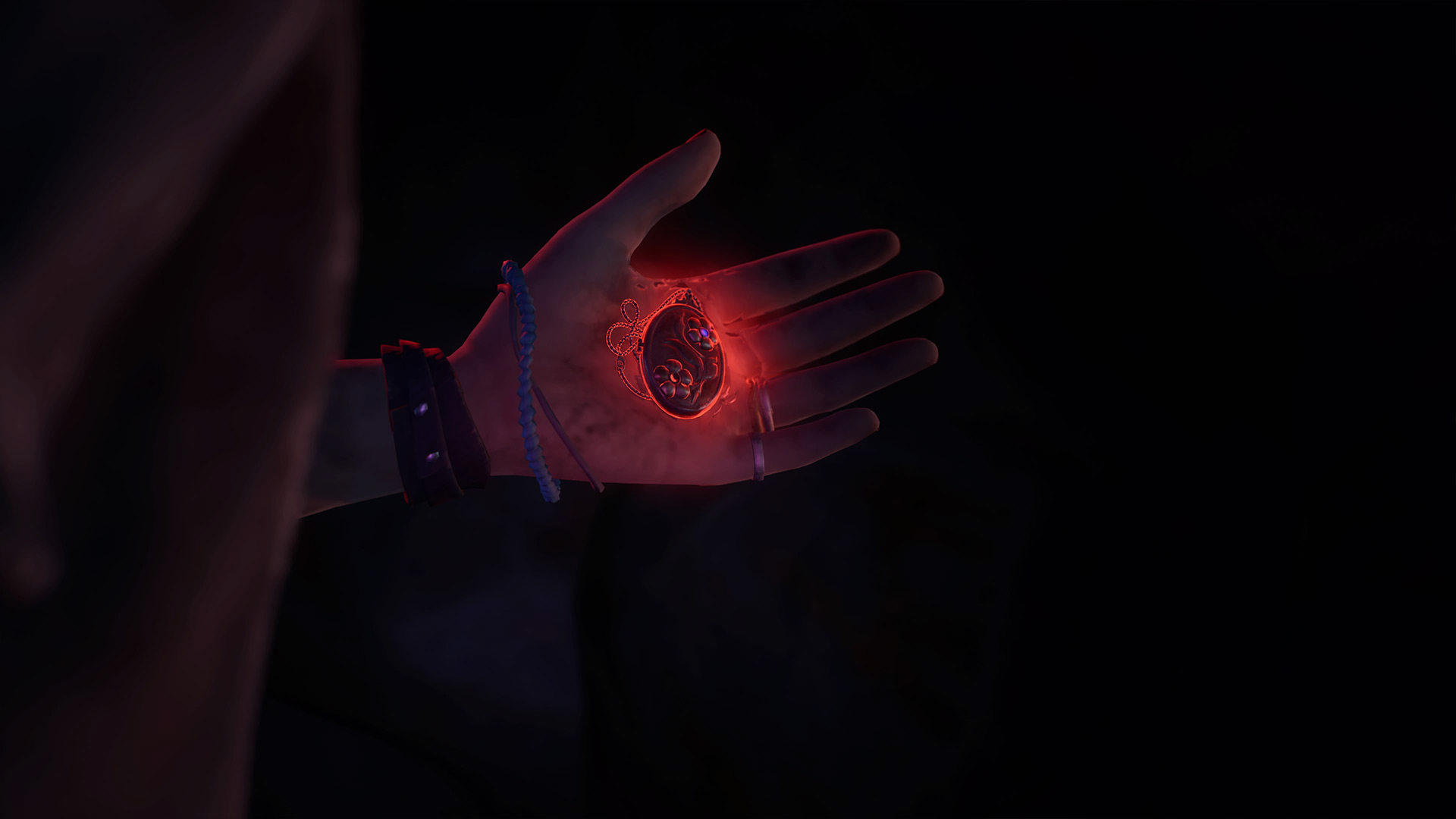 Life is Strange True Colors memory locations: Alex holding a red, glowing locket in her hand.
