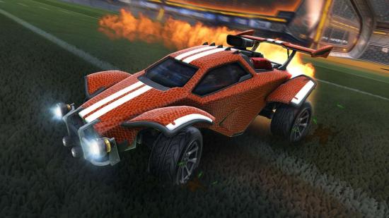 A Rocket League car sporting a burnt orange and white skin boosts away up the pitch