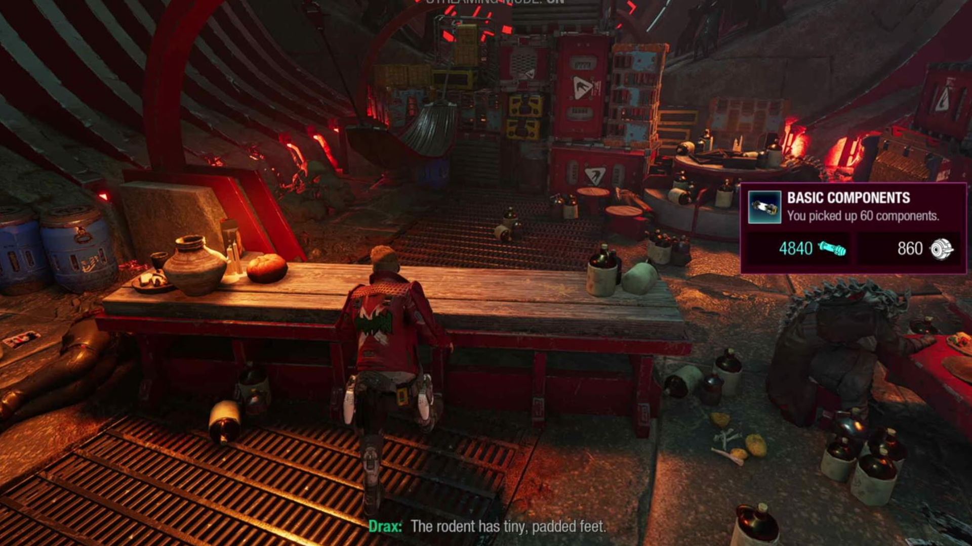 Guardians of the Galaxy outfit locations: Star-Lord can be seen looking at a bench which leads down the path to the outfit box.