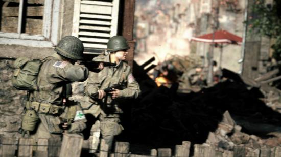Two soldiers can be seen aiming around a corner in anticipation of an enemy.