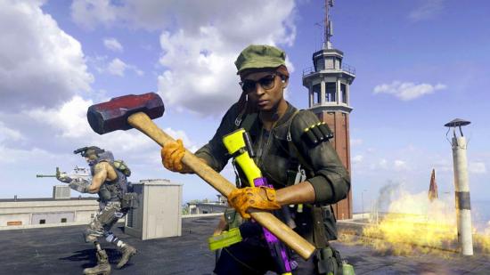 Warzone anti-cheat: A Warzone operator stands on a rooftop holding a large sledgehammer
