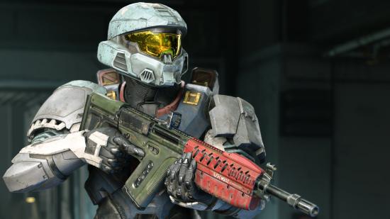 Halo Infinite ranks: A Spartan clutches a gun