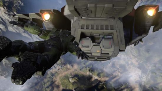 Halo Infinite Best Upgrades: Master Chief can be seen jumping off a platform and into the back of a Pelican.
