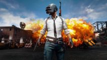 PUBG free-to-play: The iconic PUBG soldier with a white shirt and helmet walking away from an explosion