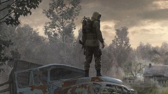 Stalker 2 Multiplayer: A Stalker can be seen standing on a car in the wasteland.