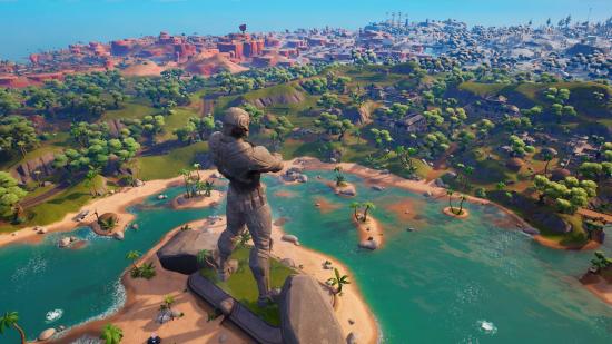 Fortnite challenges: A tall statue of a person in futuristic battle gear folding their arms looks out over the Fortnite Chapter 3 island
