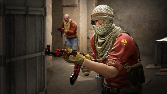 How to show FPS CS:GO - a man in red wearing a face covering and sunglasses wielding an AK-47