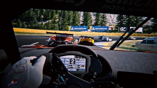 Gran Turismo 7 Split Screen: A driver can be seen racing from the cockpit view