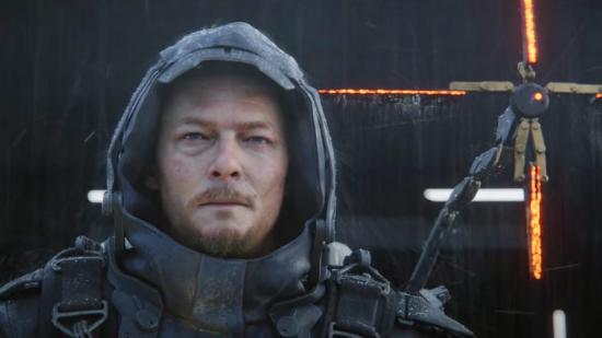 Death Stranding 2 confirmed: Sam Porter Bridges stands in the rain wearing a black hooded coat