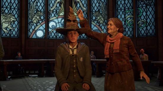 Hogwarts Legacy PS5 DualSense: A young wizard with the Sorting Hat on his head in Hogwarts Legacy
