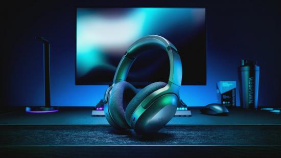 Razer Barracuda review: Razer Braacuda headset in front of a monitor, PS5, and PC