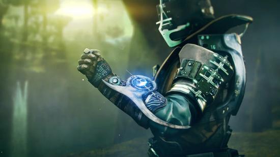 Destiny 2 exotic armour rework: A Guardian displaying their elaborate arm armour piece which has a glowing blue crystal in the middle