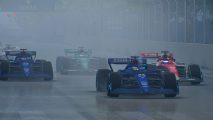 F1 Manager 2022 unpredictable race incident: An image of two Williams cars in the rain