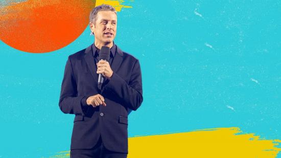 Geoff Keighley on a blue, yellow, and orange background