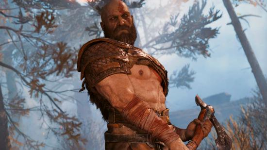 God of War Ragnarök PS5 wishlist release date: Kartos stands, axe in hand, ready to smite down this tree, he also takes note that there could be a release date announcement soon, maybe at Summer Game Fest