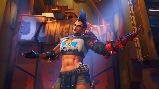 Overwatch 2 beta start time: Overwatch 2 hero Junker Queen taunts with her arms outstretched