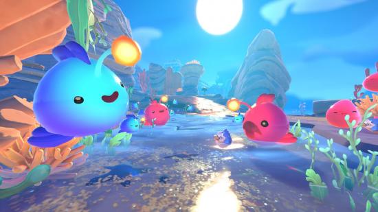 Slime Rancher 2 Gameplay: Multiple slimes can be seen in an area of the game.