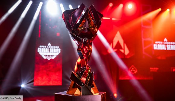 Apex Legends ALGS Year 2: The ALGS trophy sits in front of a stage, lit up in red lighting
