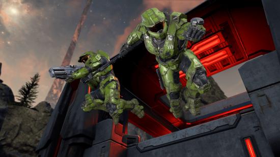 Halo Infinite devs new studio: Two spartans in green armour leap from a ledge with their weapons in hand