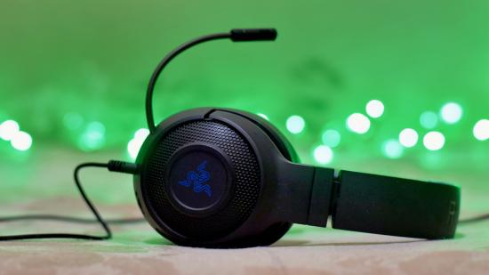 Xbox Discord voice chat: A Razer headset sat on sat with a green background behind