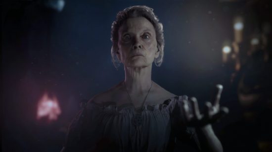 best ps5 horror games: an old lady raises her hand in The quarry