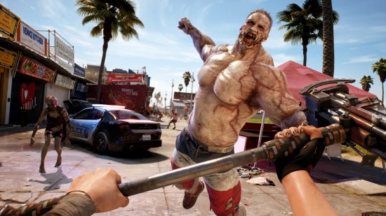 Dead Island 2 gameplay: A muscly zombie jumps to punch the plyer, who holds a sledgehammer