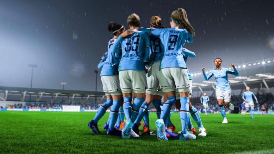 FIFA 23 graphics: A group of players from Manchester City's women's team celebrate in a huddle in rainy conditions