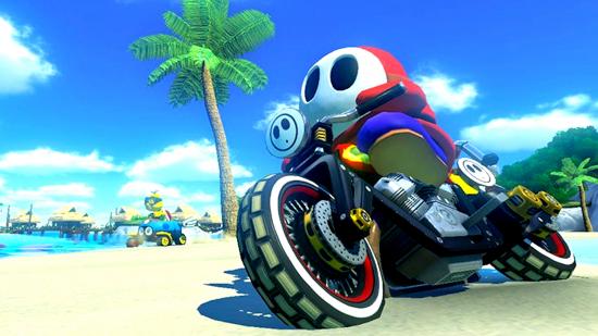 Mario Kart 8 Deluxe best Kart: Shy Guy races around a beach on a bike