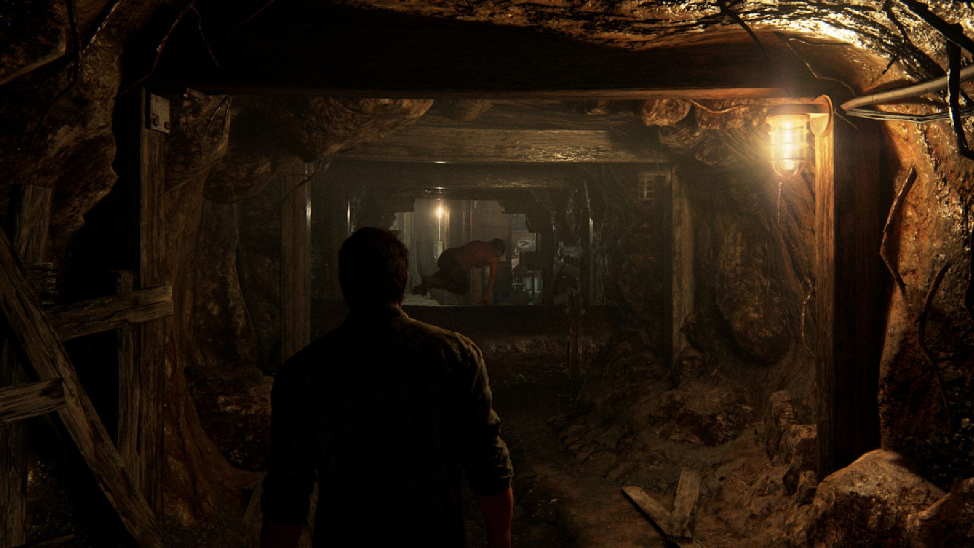 The Last of Us Part 1 Remake Review: Joel can be seen walking through an underground tunnel