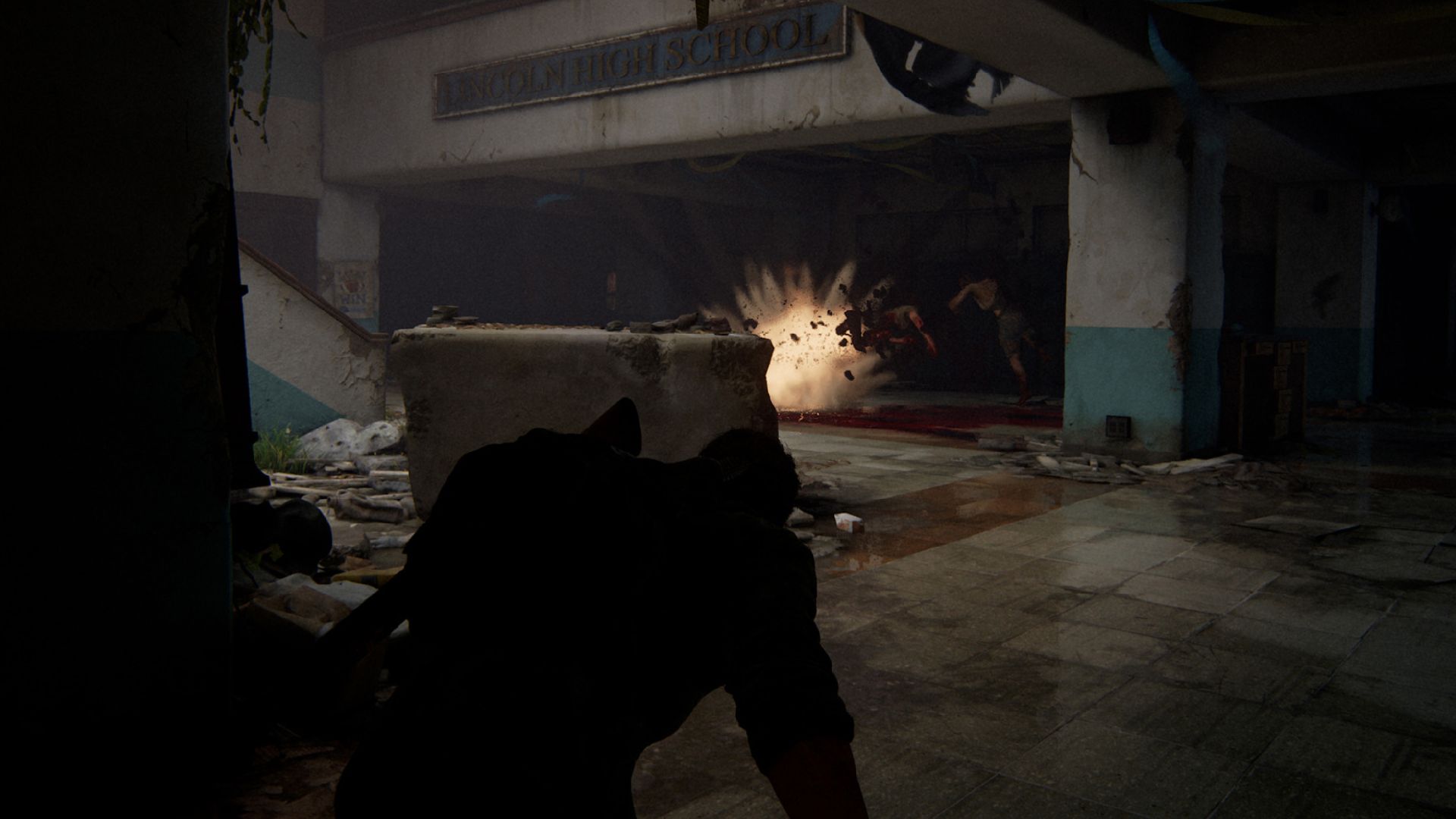 The Last of Us Part 1 Remake Review: Joel can be seen looking at an enemy explode