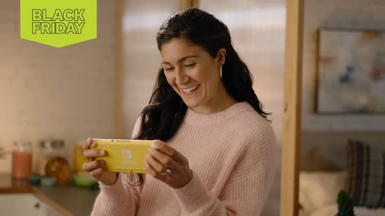 Best Black Friday Nintendo Switch deals: image shows a picture of a woman playing a Nintendo Switch Lite with a smile on her face - no doubt she got it on sale.