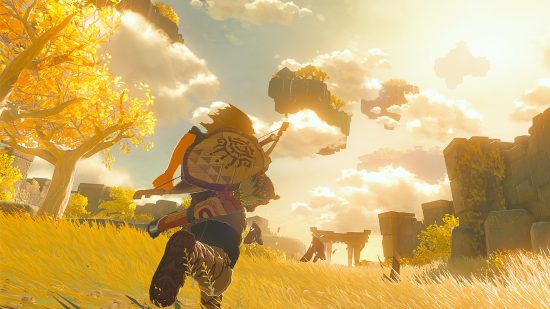 The Legend of Zelda Tears of the Kingdom reveal: Link runs through a golden field with floating rocks in the sky