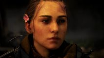 A Plague Tale Requiem review: an image of Amicia in the dark