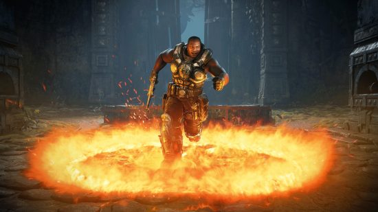 Best Xbox Series X games: A Gears 5 soldier runs through a ring of fire