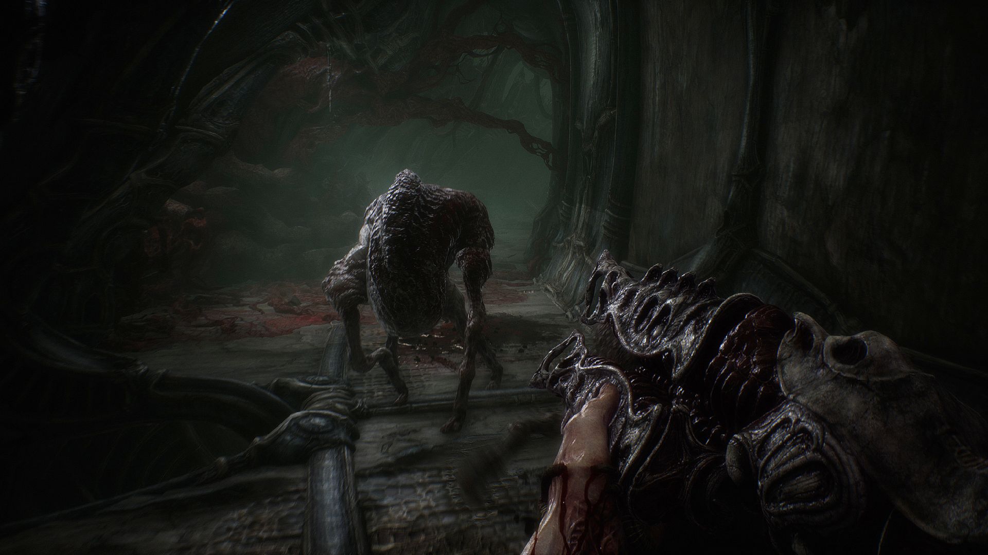 Scorn Game Pass: The player can be seen shooting a creature